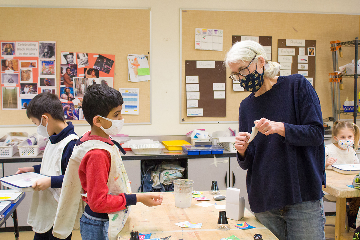 Student and teacher together in a classroom