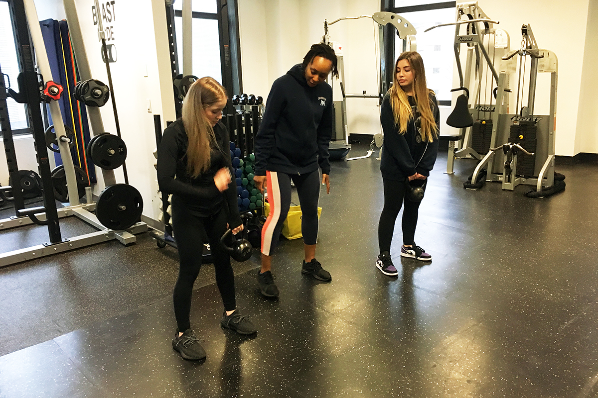 Athletes working out in a gym